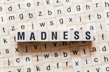 Madness word concept on cubes