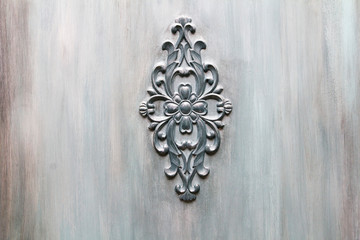 Moulding element from gypsum on wall texture blue color. Rococo romantic style