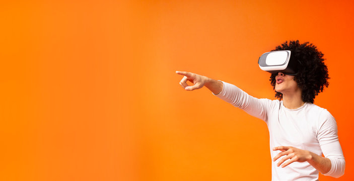 Young african american man experiencing virtual reality