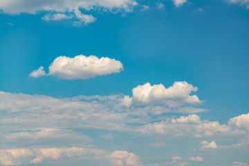 White clouds against the blue sky