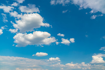 White clouds against the blue sky