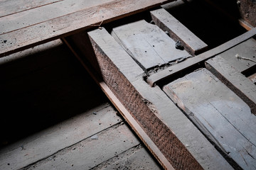 construction detail, metal and wood beam closeup in  attic / loft -