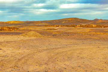 Fototapeta na wymiar Black stoned desert in Merzouga Sahara near Erg Chebbi, Morocco in Africa