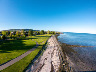 Beautiful landscape, Aerial view on coast of Irish Sea against clear blue sky. Drone view on beach 