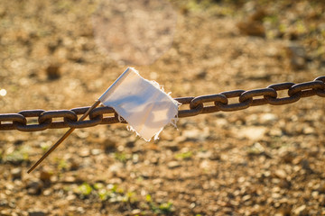 Chain with white flag