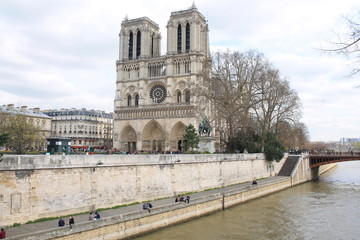 Fototapeta na wymiar River seine and Notre Dame de Paris, a medieval Catholic cathedral in capital city of France
