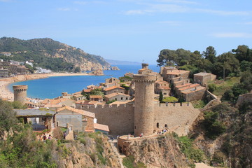 Fototapeta na wymiar Tossa de Mar, a charming historic town constructed around a magnificent ancient castle, located in the Spanish region of Catalonia on the Costa Brava