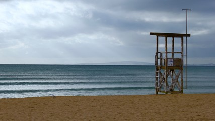 Watchtower on the sandy beach shore