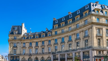 Obraz premium Paris, the place des Victoires, typical parisian facades and windows 