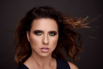 Fototapeta premium Fashion portrait of young beautiful woman. Brunette girl. Perfect make-up. Beauty style woman