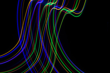 3D illustration. Abstract patterns of lights on black background. Lines of colors, luminous strokes.
