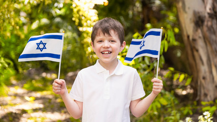 Israeli Happy Boy Hold and Waving Israeli Flag On Independence Day