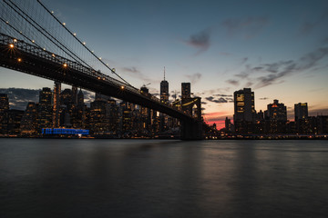 Fototapeta na wymiar Brooklyn Bridge and Downtown Manhattan at Sunset from DUMBO