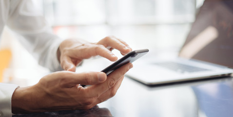 Male hands with smartphone