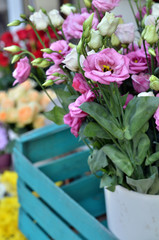 Roses in the decorative blue box in the flower shop.