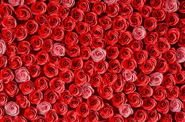 Many red and pink decorative roses background