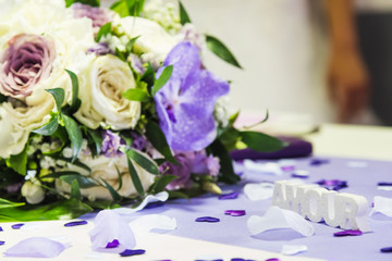 Bouquet of flowers on the table of a reception room of a wedding