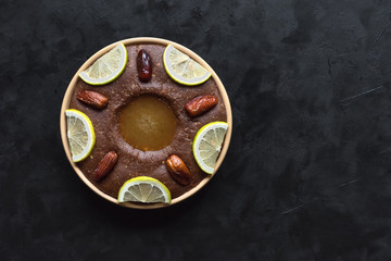 Saudi Arabia traditional dish Hineni, it is a mixed of dates and whole wheat. Ramadan food