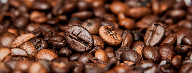 Mixture of different kinds of coffee beans. Coffee Background, panorama