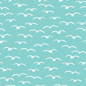 Cute seagulls flying in summer sky. Marine animal bird seamless vector background. Hand drawn sealife tile. All over print kids textiles. maritime fashion all over prints, classy nautical home decor.