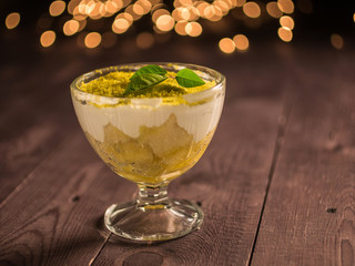 shortbread cake with cream dessert in a glass container