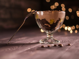 coffee dessert on a wooden Board with bokeh background
