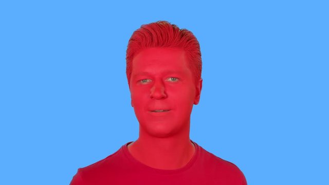 The face of men painted with red paint