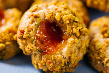 Italian Pistachio Cookies with Jam Or Jelly Centers. Selective focus.