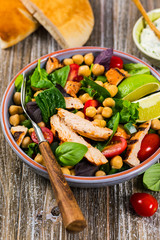 Mediterranean Grilled Chicken Salad with Chickpea or Garbanzo Beans. Selective focus.