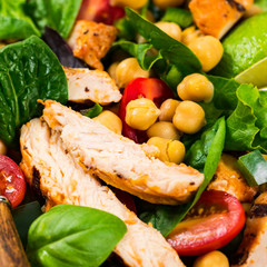 Mediterranean Grilled Chicken Salad with Chickpea or Garbanzo Beans. Selective focus.