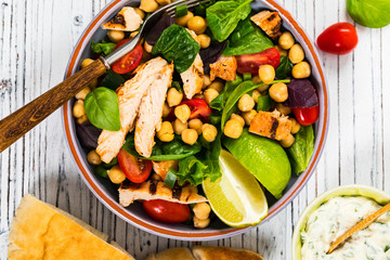 Mediterranean Grilled Chicken Salad with Chickpea or Garbanzo Beans. Selective focus.