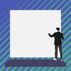 Obraz premium Short hair immature young man stand in front of rectangle big blank board Design business concept. Business ad for website and promotion banners. empty social media ad