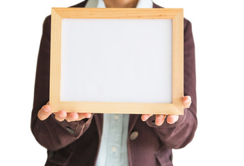 Blank wooden photo Frame in the woman's hand isolated on white background .Blank space for text and images of file with Clipping Path .