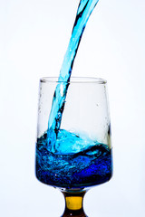 Pouring water into a fancy glass