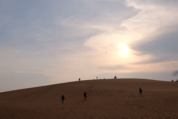 Fototapeta na wymiar beautiful red sand dunes on sunset