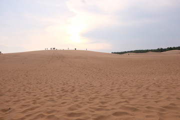 beautiful red sand dunes on sunset