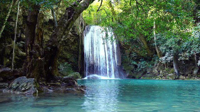 Erawan waterfall in Kanchanaburi, Thailand. Beautiful waterfall with emerald pool in nature.