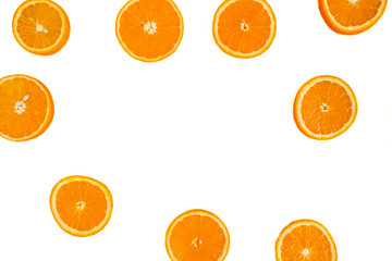 Sliced orange slices lie on a white background. Sliced orange isolate