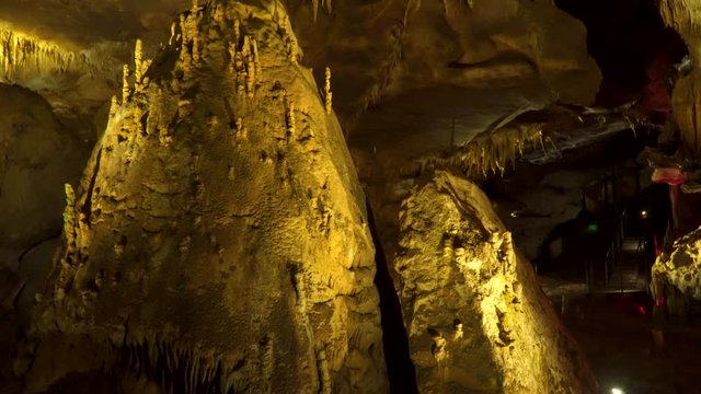 Prometheus Cave in Georgia. Stalactites and stalagmites in a cave