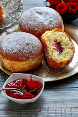 Fat Thursday celebration - traditional polish donuts filled with marmalade.