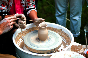 Learning pottery craft. Master class for clay modeling. Earthenware jug making