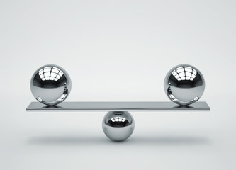Balance concept. Composition of glossy metal spheres