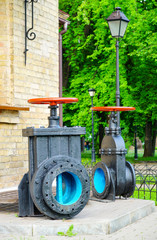 Fototapeta na wymiar Old Gate valves, water pipeline, heat circuit.