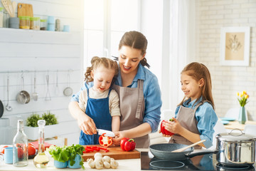 Happy family in the kitchen.