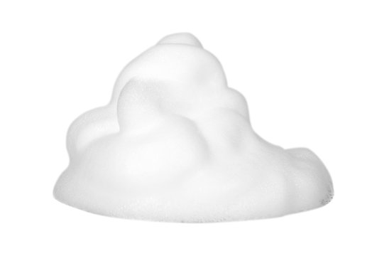 White foam bubbles, beauty smooth mousse, close up photo.