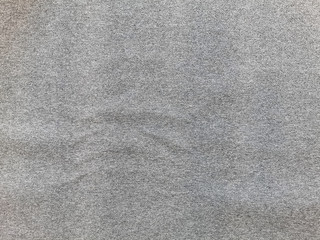 Seamless close up of monochrome grey carpet texture background from above