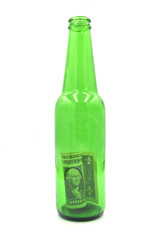 Picture of a green beer bottle with a dollar banknote on the isolated background