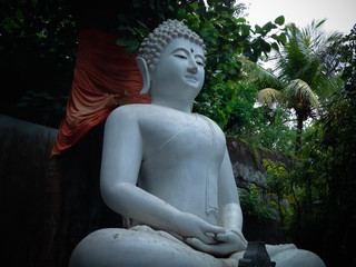 Natural Garden With Big White Buddha In Meditation Statue At Buddhist Monastery In Bali, Indonesia