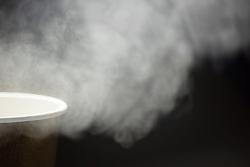 Craft paper cup in a steam