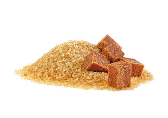 Brown sugar cubes and crystal sugar on white background